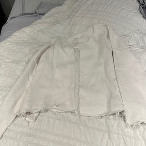 Planet sweater with frayed bottom and cut out center